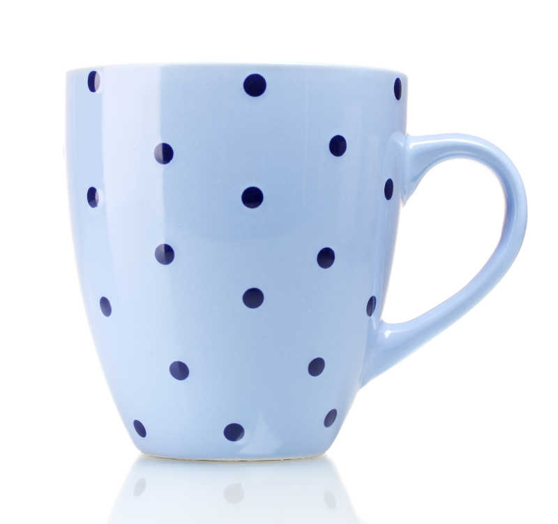 白色背景白色黑点的咖啡杯