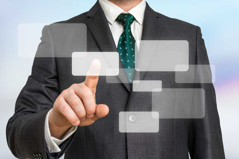 商人手指触摸屏幕按钮