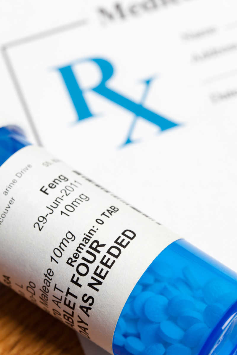 蓝色的药瓶和处方医疗保健