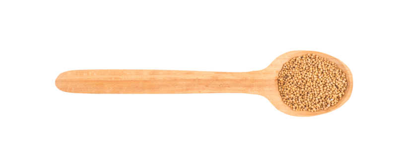 木质勺子中的芥末籽