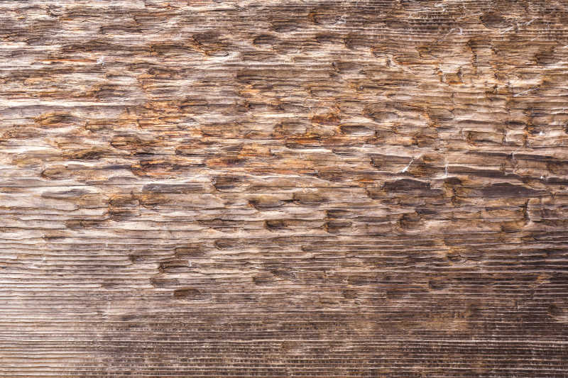 凹凸不平的陈年老木纹理