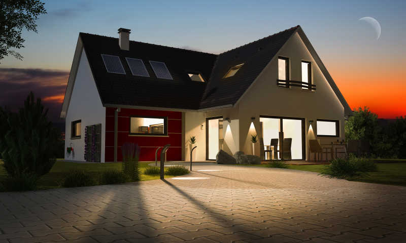 日落下开着灯的房子