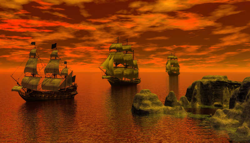 晚霞中行驶在海上的帆船