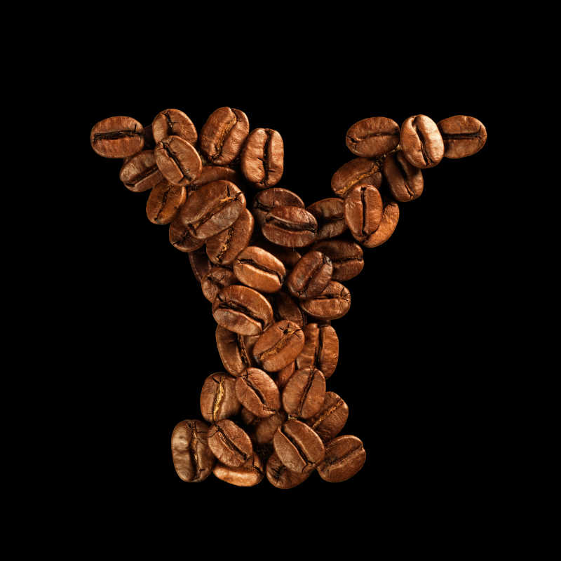 由咖啡豆排列的字母Y