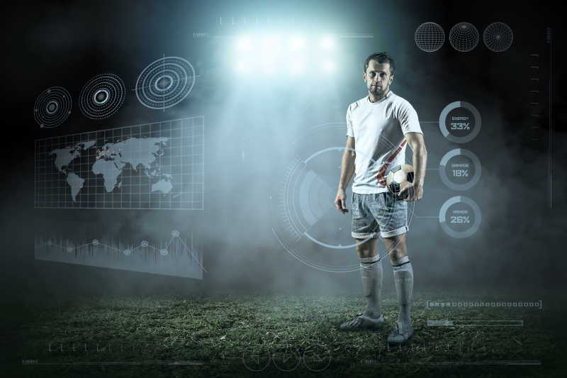 抱着足球的足球运动员