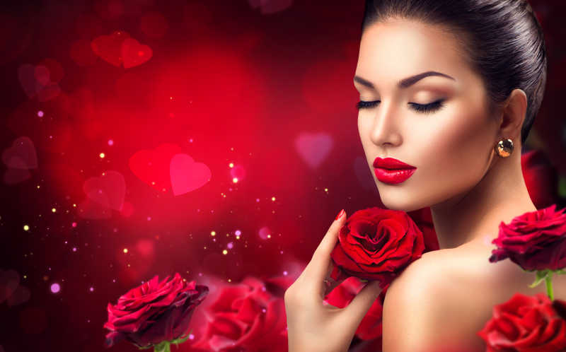红色背景下性感的红唇美女与红玫瑰