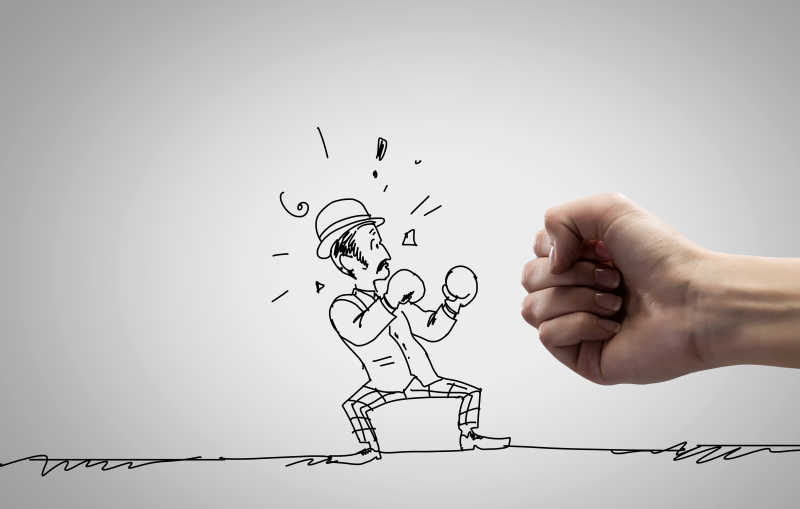 握着拳头的手和绘画中戴着拳击手套的人互动