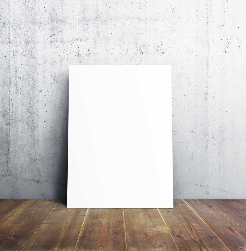 白色墙面前木质地板上的空白框