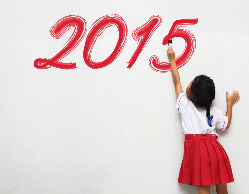 小女孩写新年快乐2015