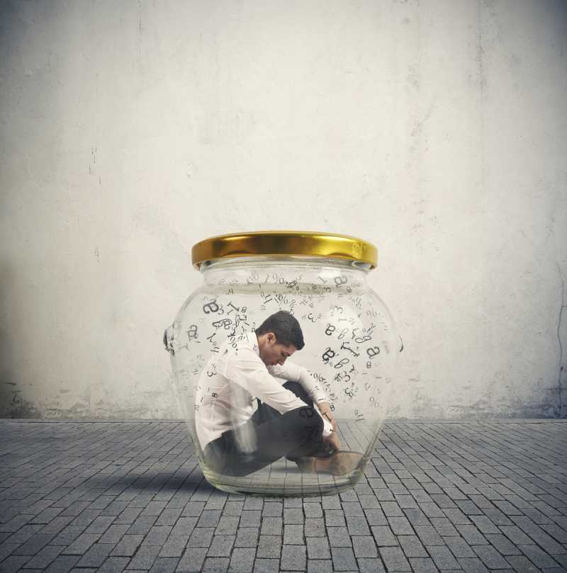 玻璃瓶中的商人封闭安全概念