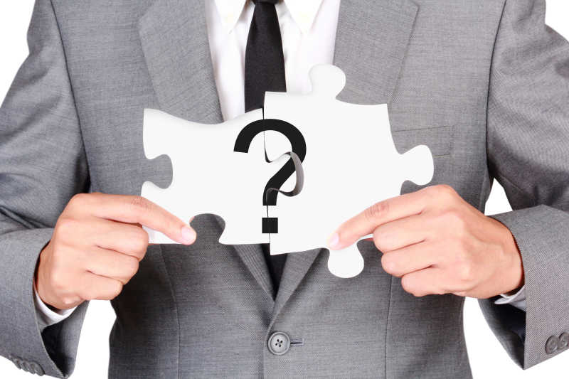 商人手里的问号拼图