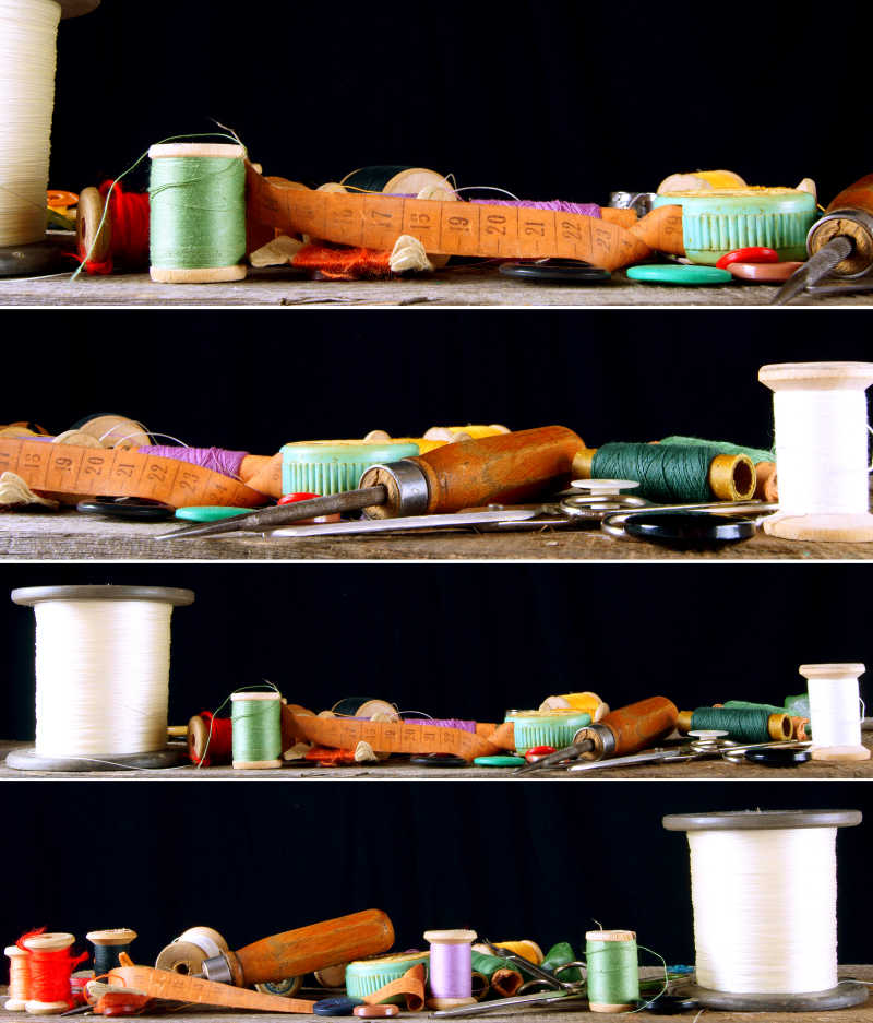 黑色背景下木架上的各种各样的缝纫工具