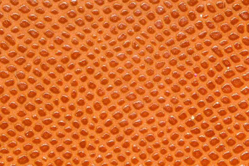 爬行动物的橙色人造革纹理