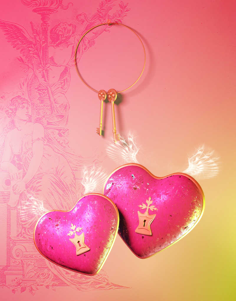 有金色的图案和钥匙的红心形状的情人节礼物