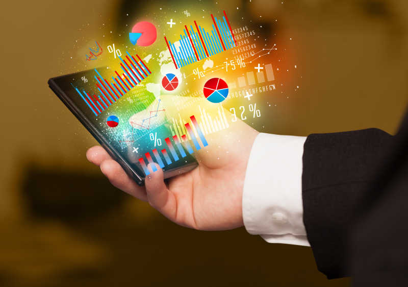手持智能手机上的图表符号概念