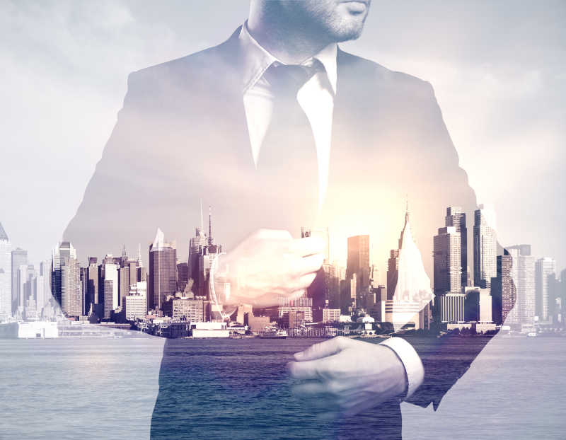 抽象城市背景下的西装青年