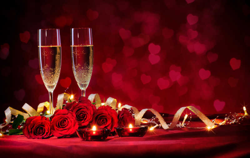 情人节红色背景香槟和玫瑰