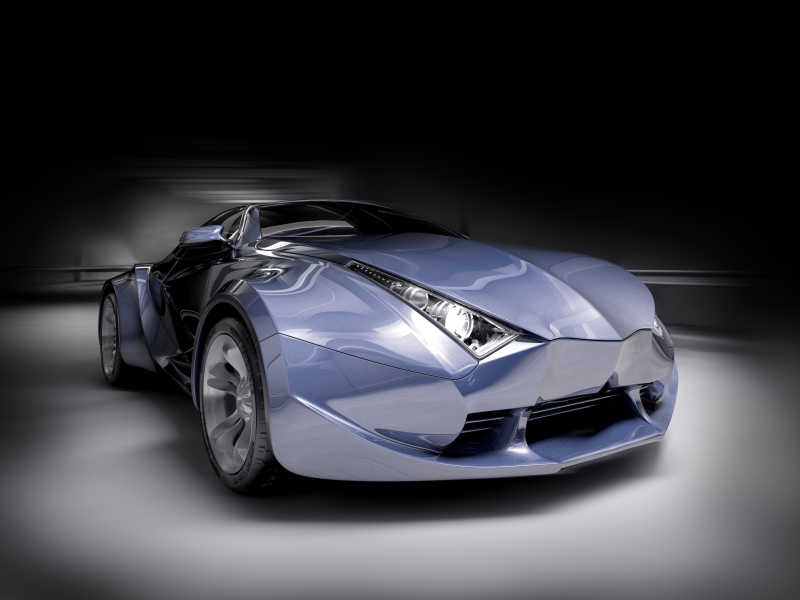 暗色背景下的蓝色跑车