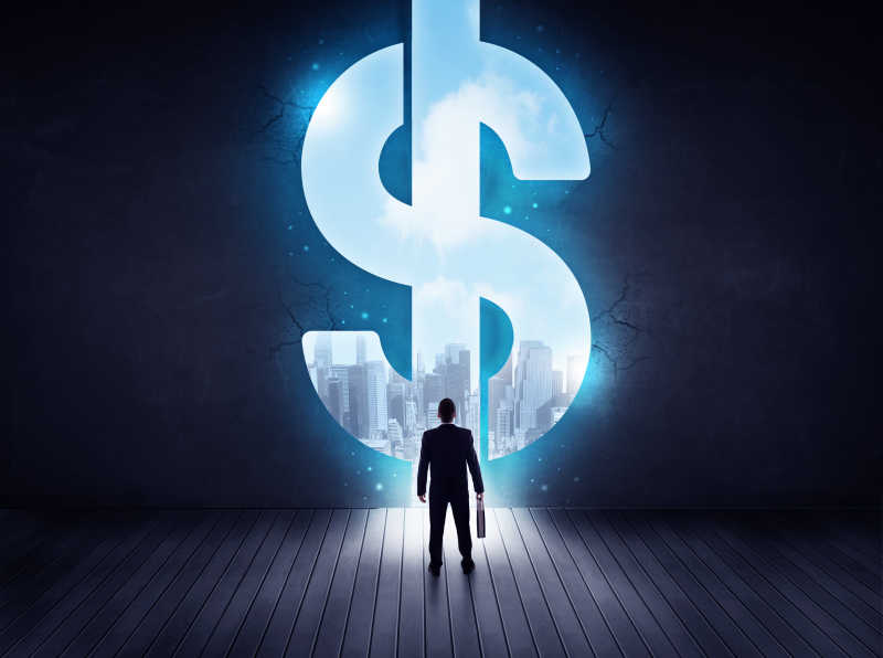 商人面前有一个大大的发光美元标志