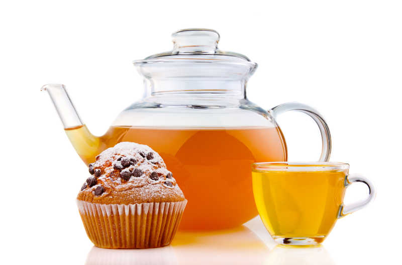 玻璃茶壶茶杯与蛋糕