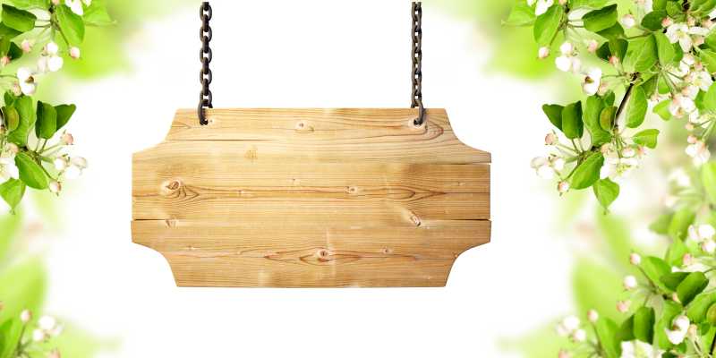 花卉背景上的木制广告牌