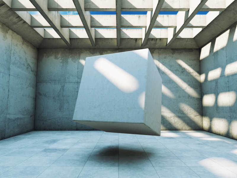 阳光下灰色的建筑混凝土施工设计造型