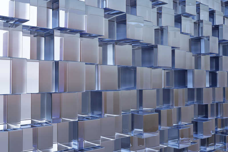 凹凸不平的银色正四边形金属背景