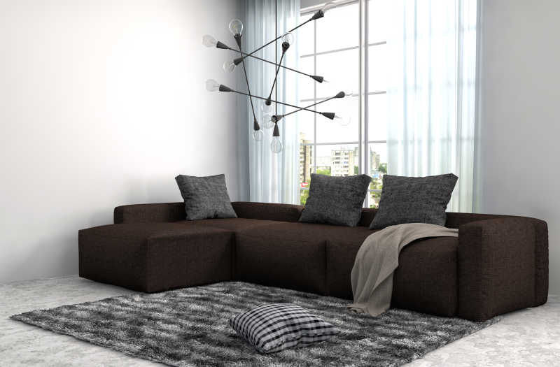 咖啡色沙发与灰色地毯