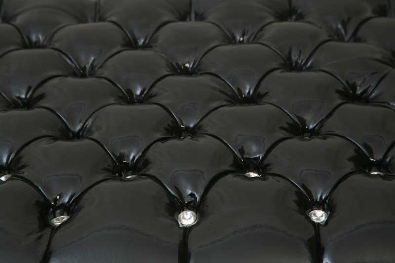 黑色豪华扣真皮图案背景