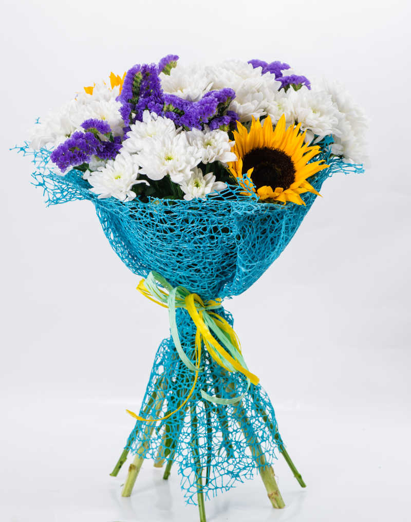 向日葵花束图片 用蓝色包装纸扎成的向日葵花束素材 高清图片 摄影照片 寻图免费打包下载