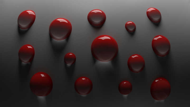 灰色背景下的红色光滑小球