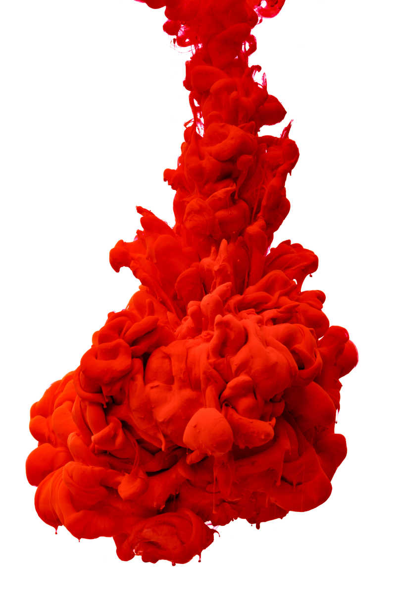 在水彩色液体中的红色的颜料