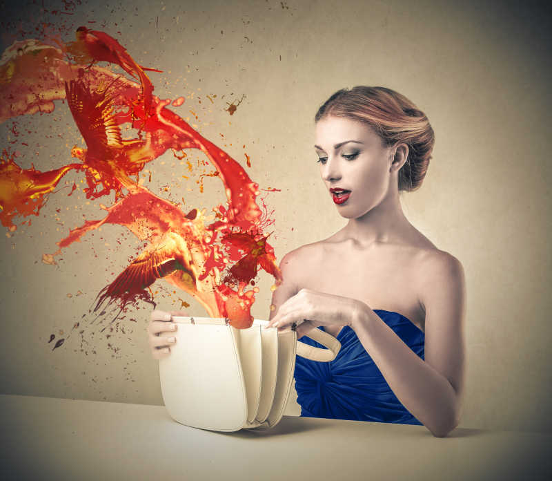 优雅的女性的白色手提包飞出鸟的创意