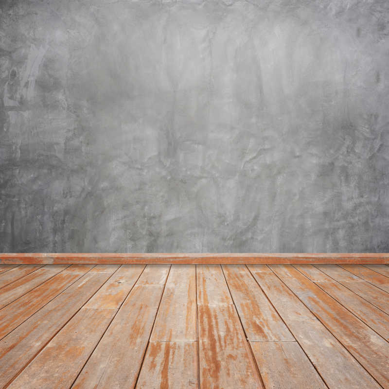 木地板和灰色的混泥土墙