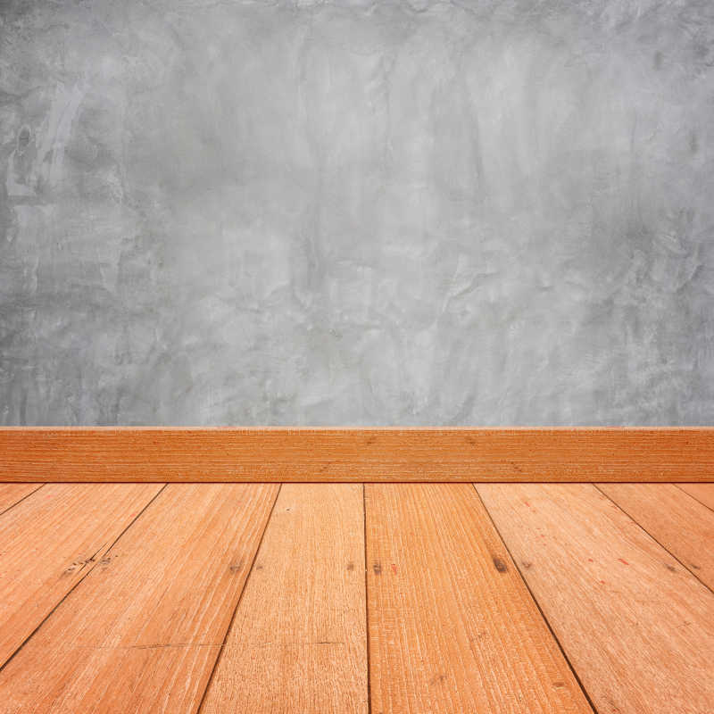 木地板和混泥土墙连接背景