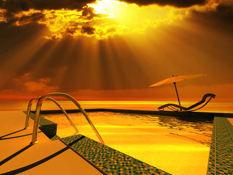 夕阳下的豪华近海游泳池