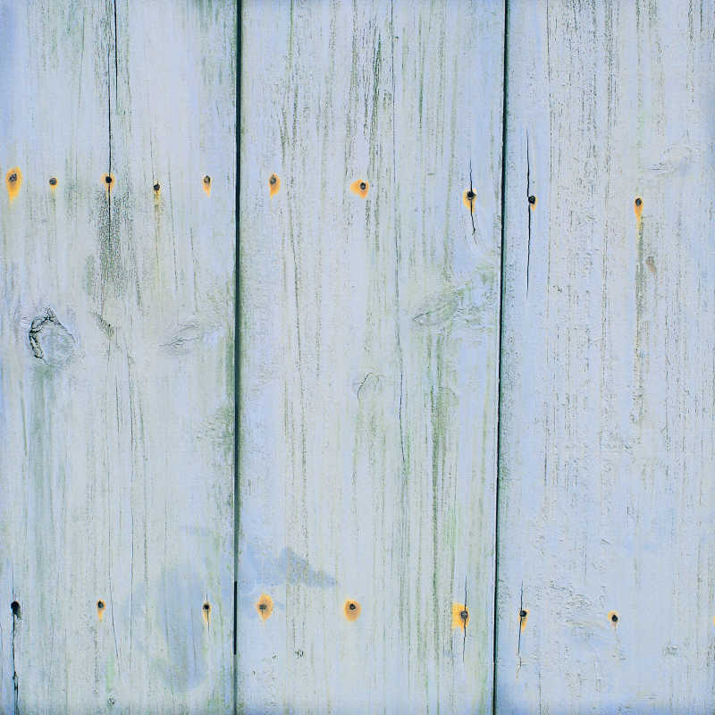 有着钉孔的白色木板背景