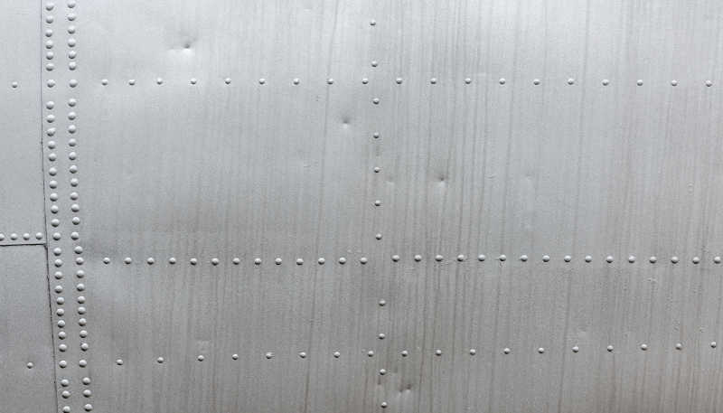 铝合金纹理铆钉的背景