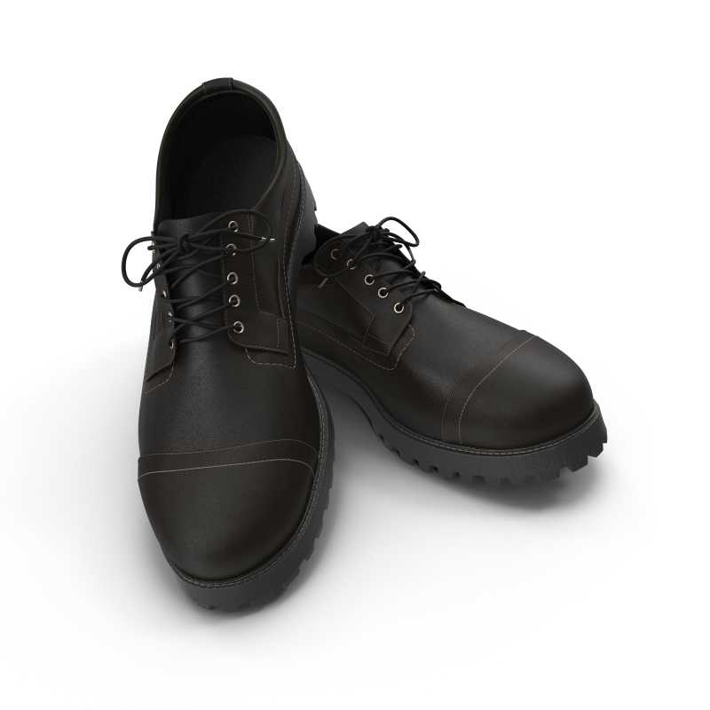 白色背景上的黑色尖头男士皮鞋