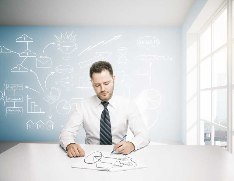 在商务办公室内做商务素描的商人做文书工作