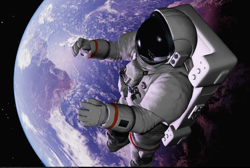黑色背景下穿着宇航服的飘在太空中的宇航员