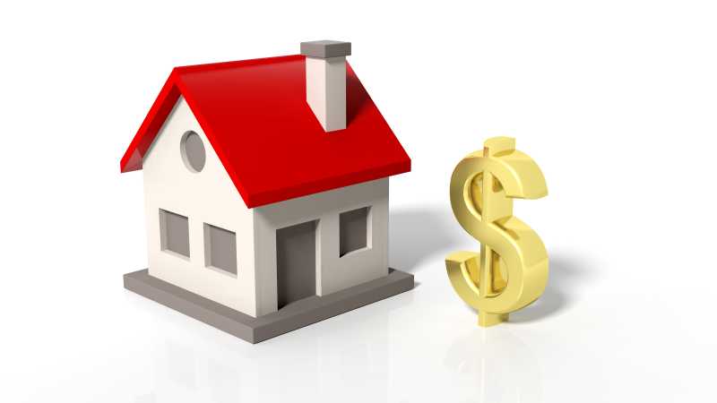 白色背景下的金元符号房屋模型