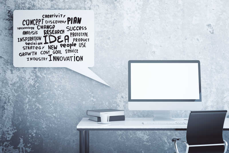 办公桌后面的水泥墙面