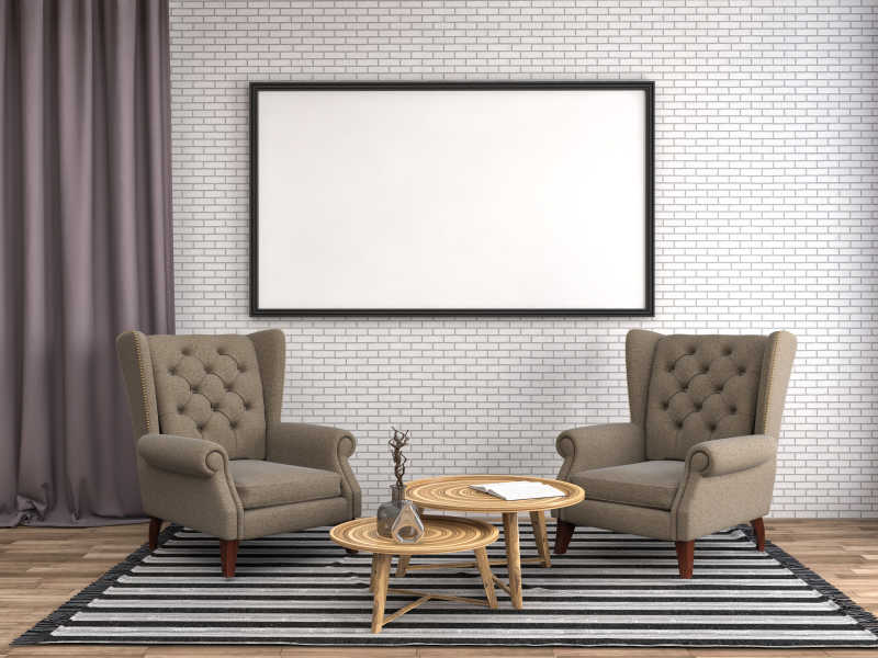 两张低调奢华的单人沙发上的空白画框