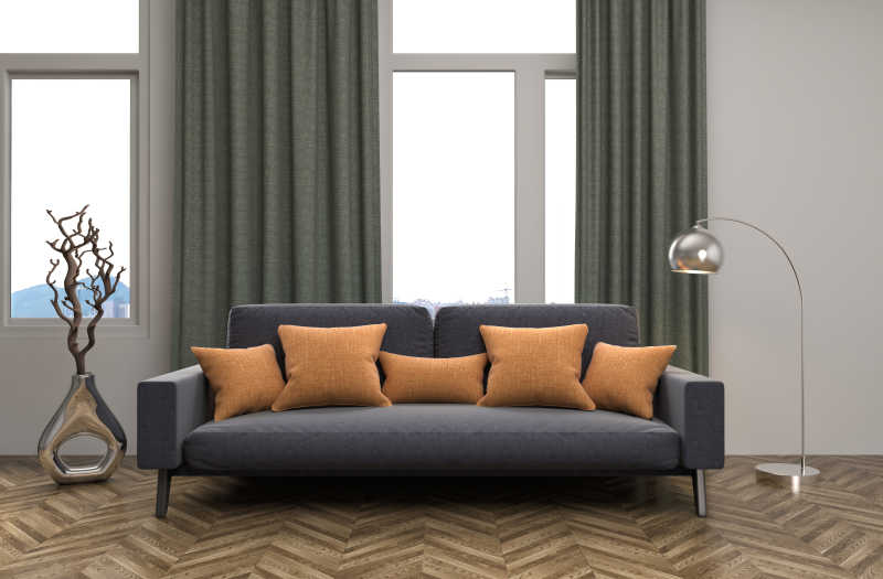 客厅里线条流畅的灰色沙发