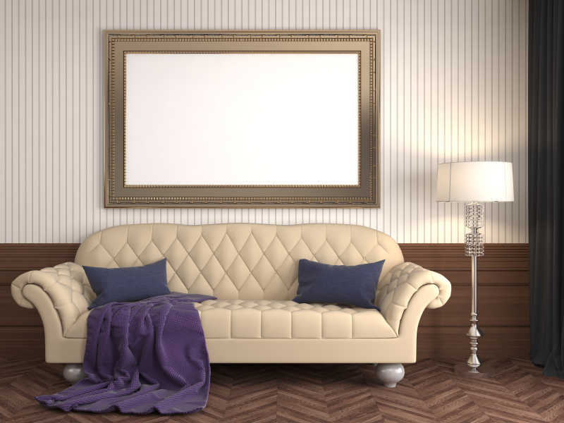 白色皮具沙发上方的空白画框