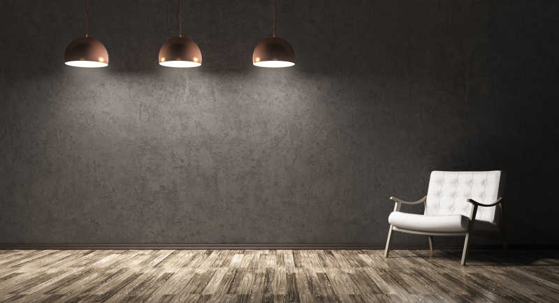 有三盏吊灯和白色椅子的深色房间