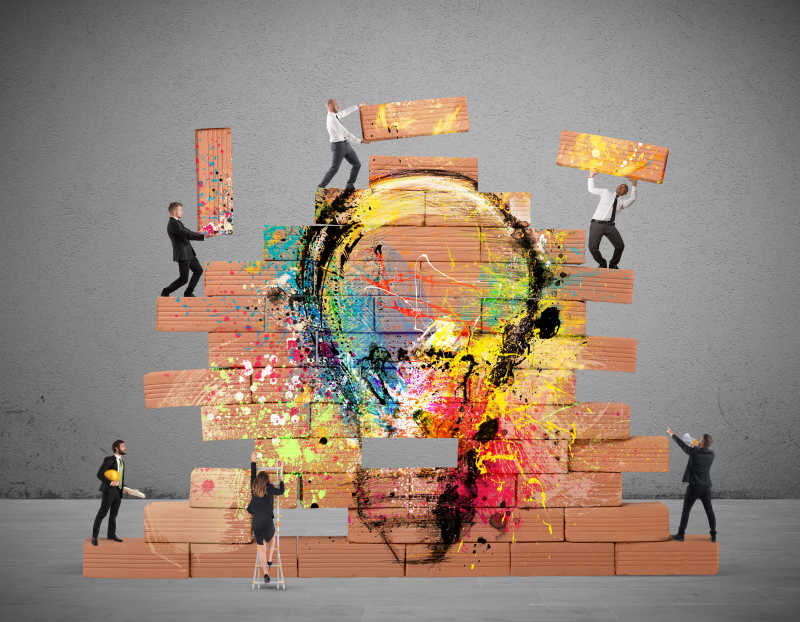 一个用拉制灯泡建造大砖墙的商人