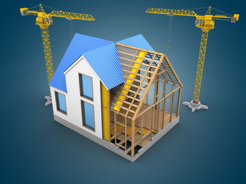 蓝色背景下起重机和房屋建筑模型设计蓝图