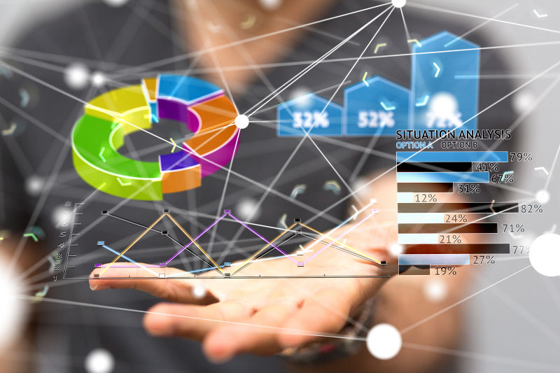 商人手上显示着彩色的虚拟数据图表